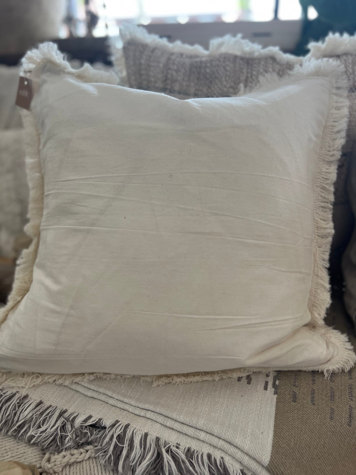 Textured Striped Cushion with Fringe
