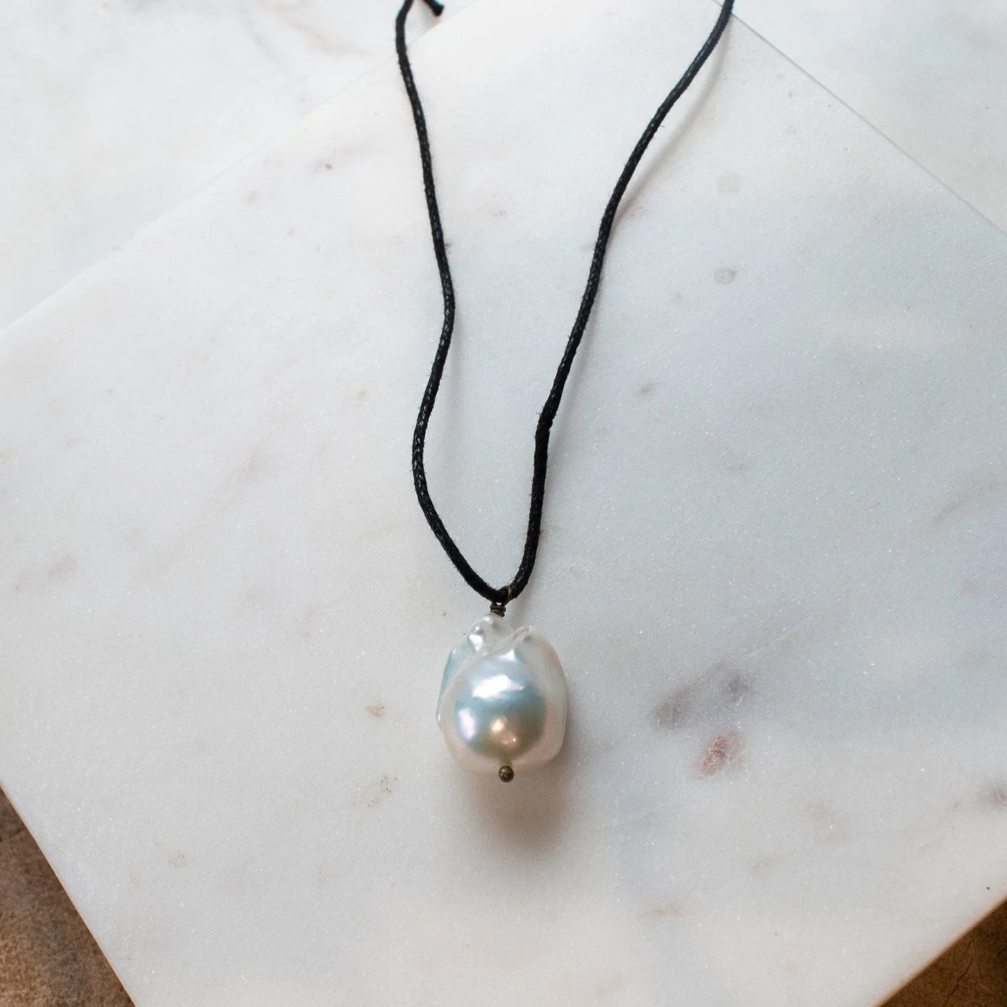 The LUMAR Baroque Pearl Necklace on Black Cord